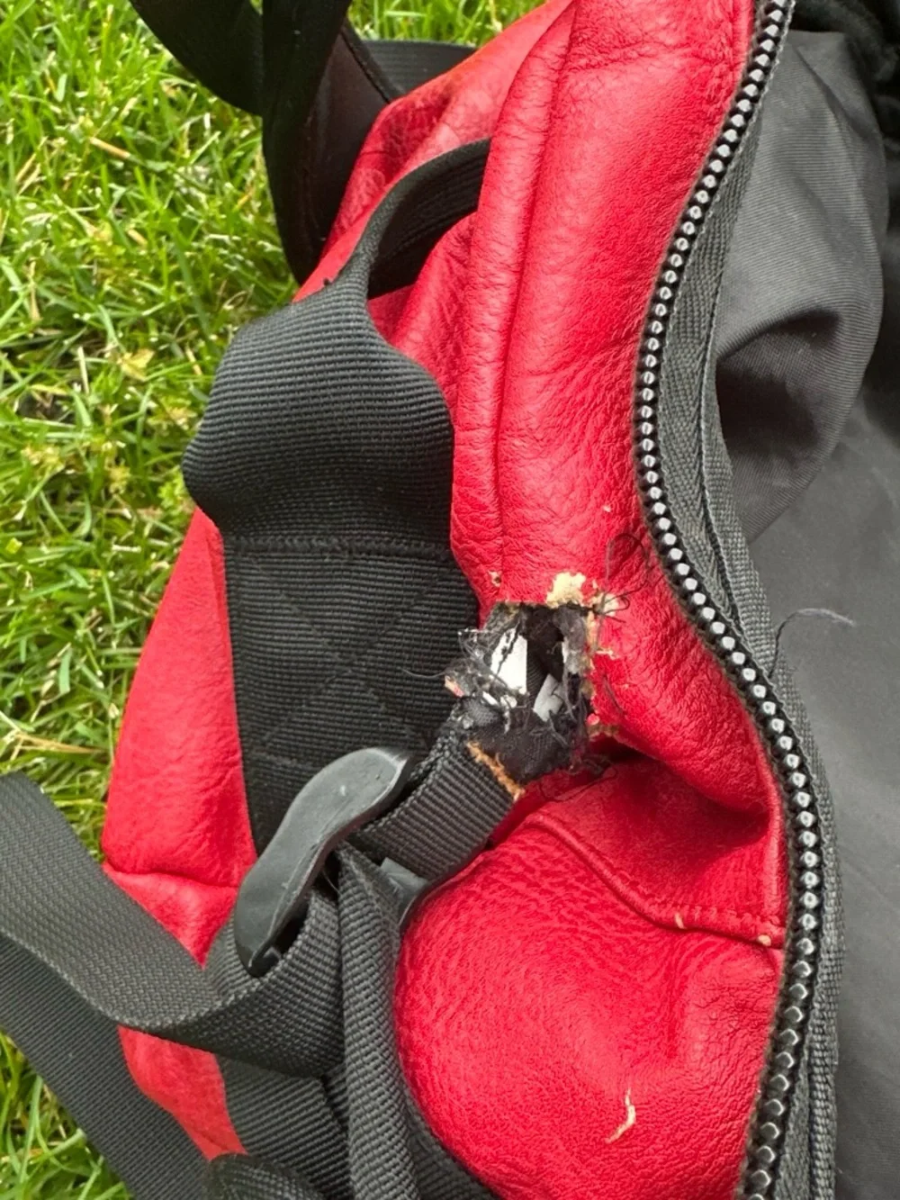 The North Face x Supreme Red Duffel Bag with Black Straps